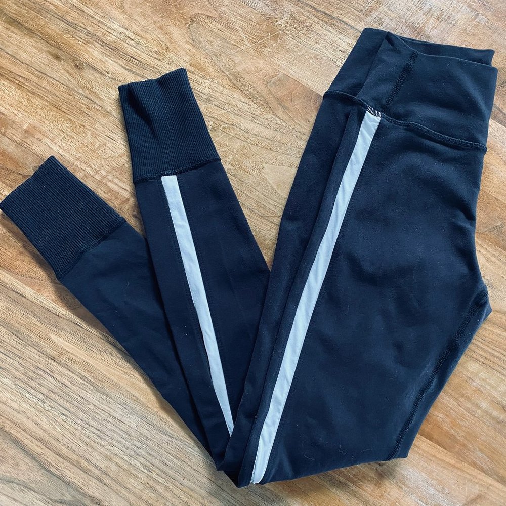 Splits59 leggings in black with white side stripes